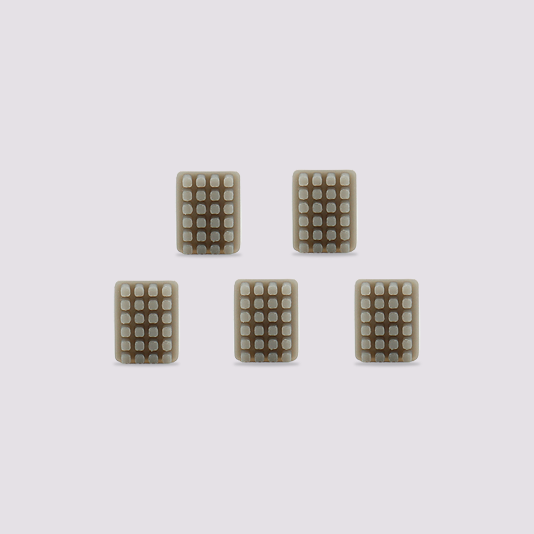 Five silicone wiper cases for Max4 3D printer, each with a grid of raised dots for cleaning.